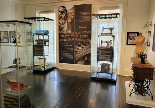 The 'What's Your Type?' exhibit displaying typewriters and sewing machines..