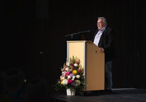 Acting Mayor, Marc Grant speaks at the podium at the 2024 Community Spirit Awards celebration.