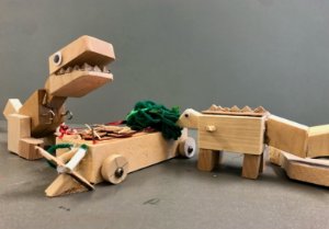 Image of wooden toys made by children.